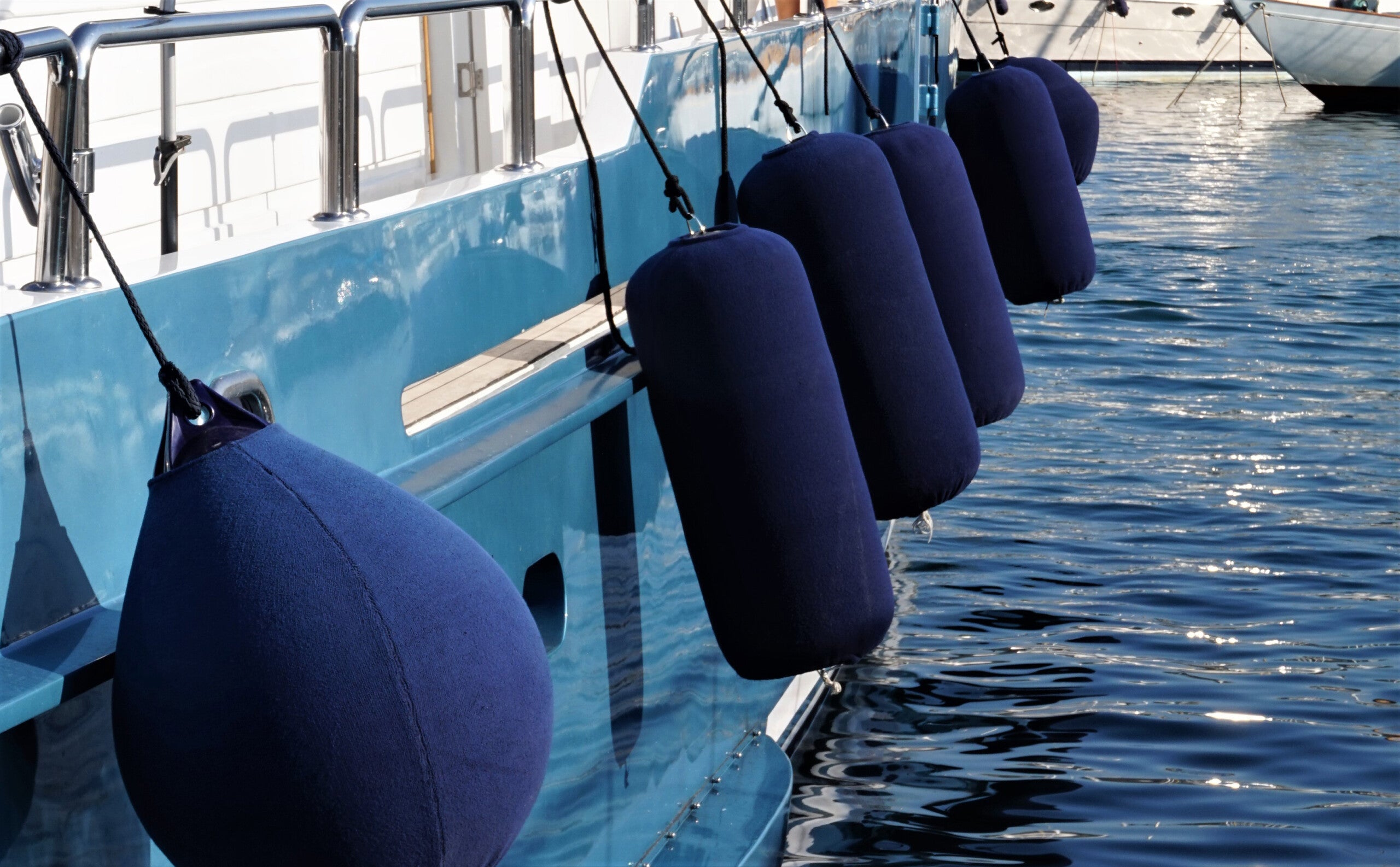 "Durable boat fender covers – protective sleeves for dock fenders in various sizes and colors"