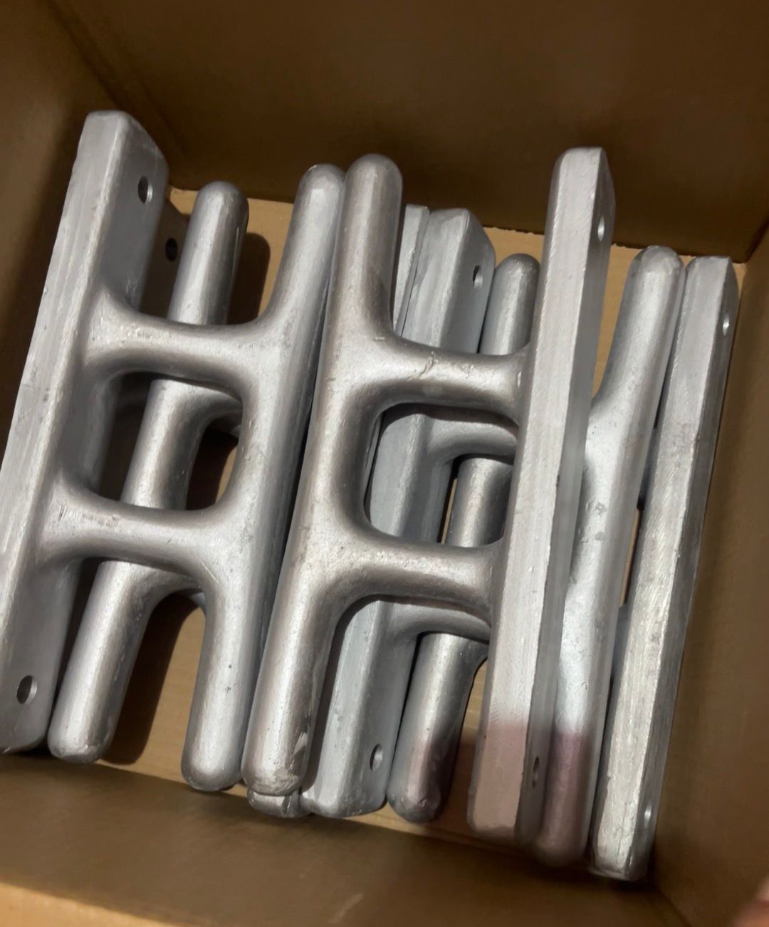 12-inch aluminium dock cleat, 12" base with 2-hole M12 mounting, clear anodized finish — available in rimal marine in uae